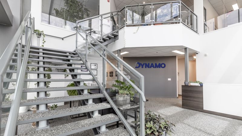 Dynamo Office Stairs - Saskatoon - LOGO Replaced - 06-14-2022.jpg